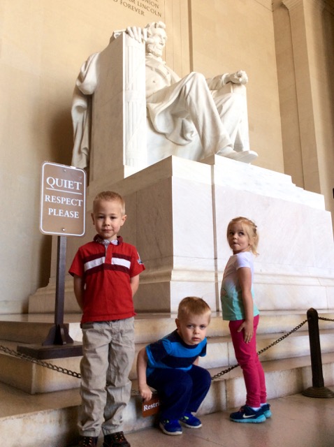 A photo of the kids in front of the Lincoln Memorial